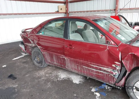 2002 Toyota Camry Le from USA, damaged, VIN 4T1BE32K02U112394